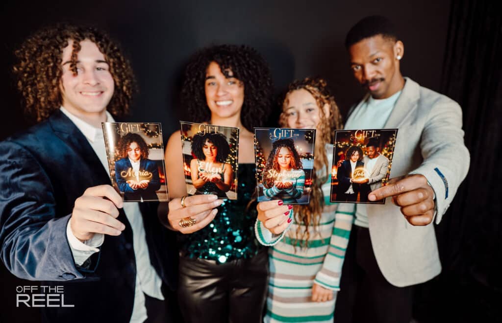 people holding holiday gift photos