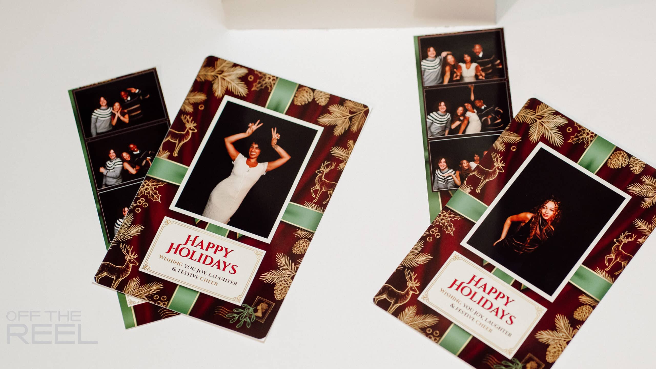 Printed happy holidays photo prints and matching photo strips display fun festive moments from the experience